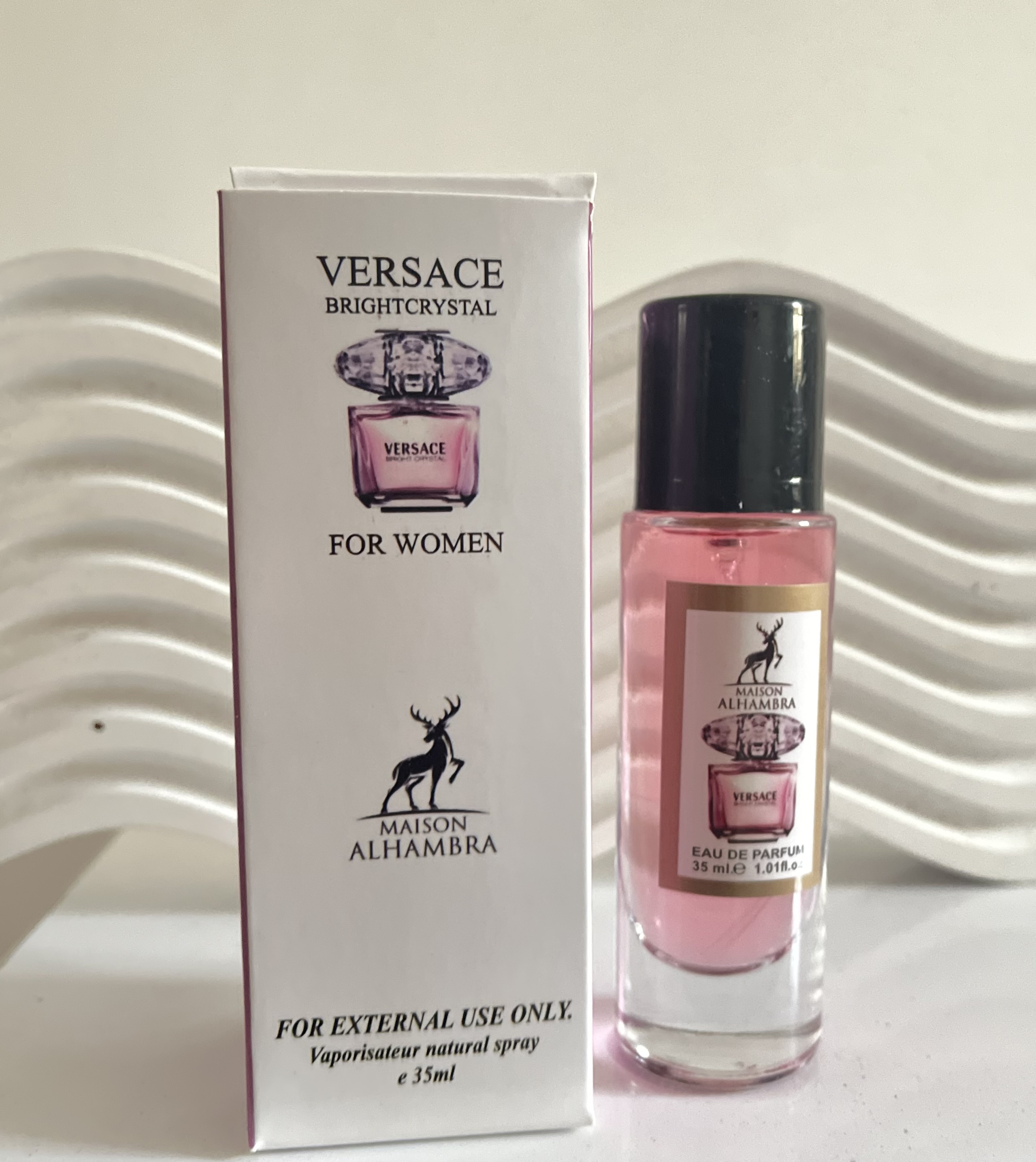 ادکلن قلمی الحمرا رایحه ورساچه صورتی