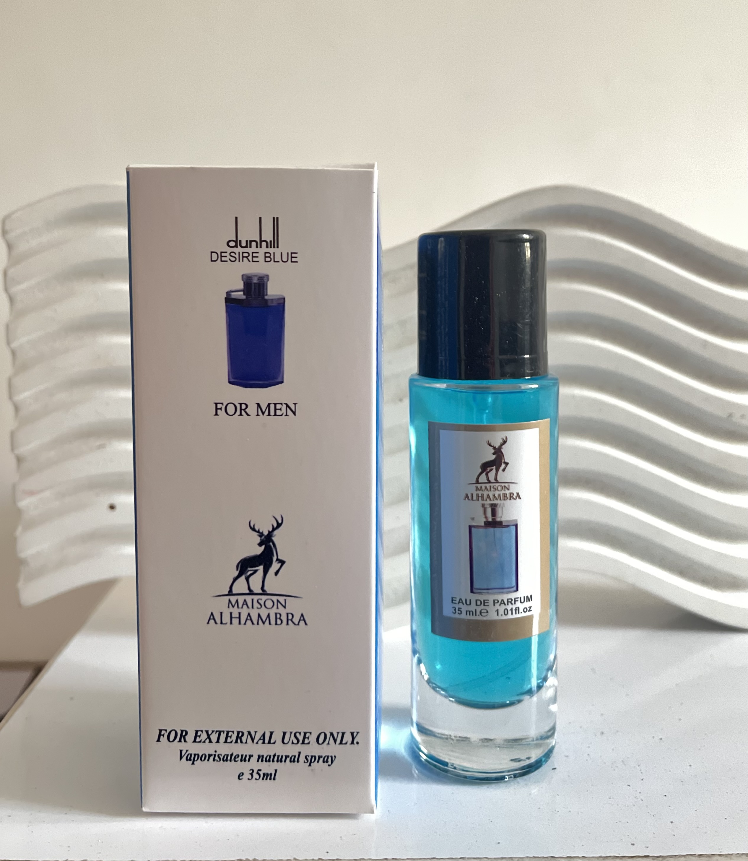 ادکلن قلمی الحمرا رایحه دانهیل آبی